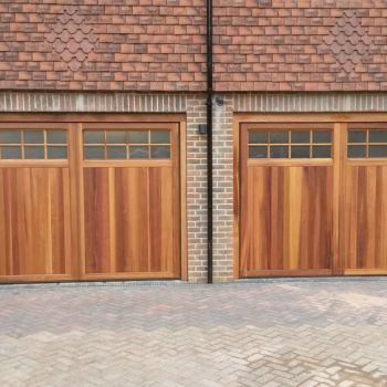 Two Wooden Electric Garage Doors