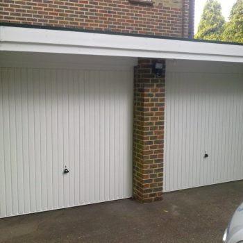 Two White Steel Garage Doors
